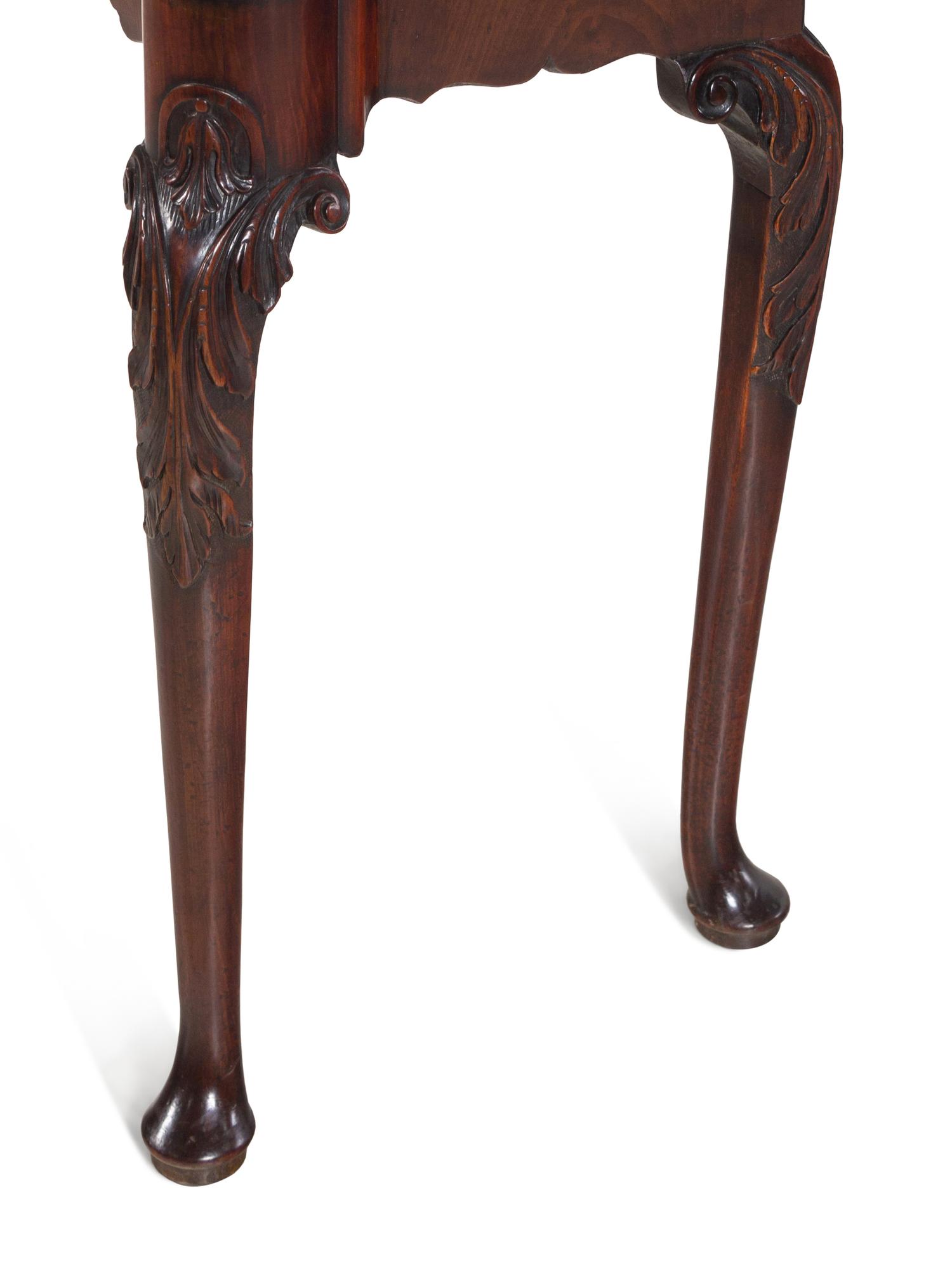 An Irish George II Mahogany Triple-Fold Game Table