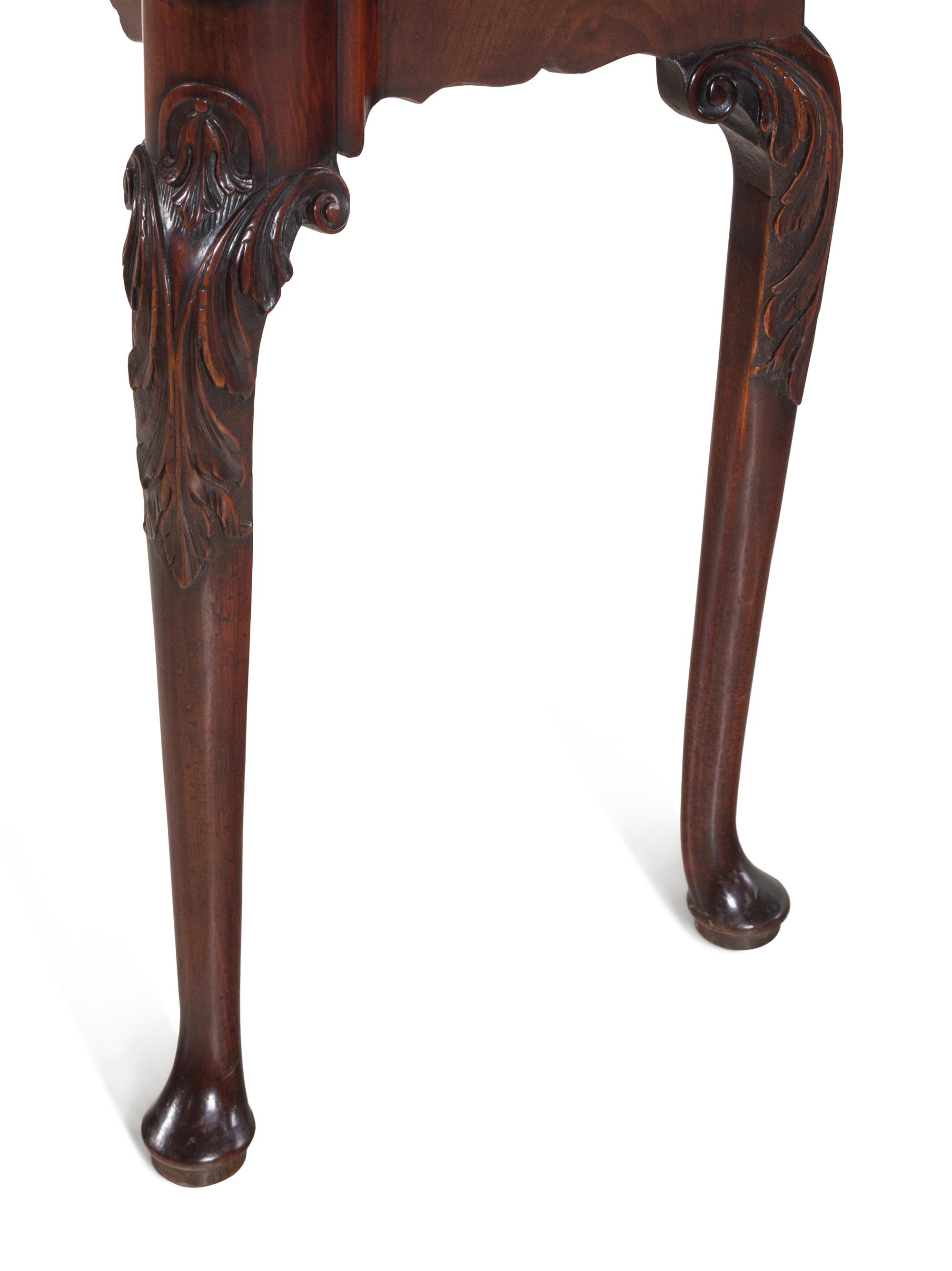 An Irish George II Mahogany Triple-Fold Game Table