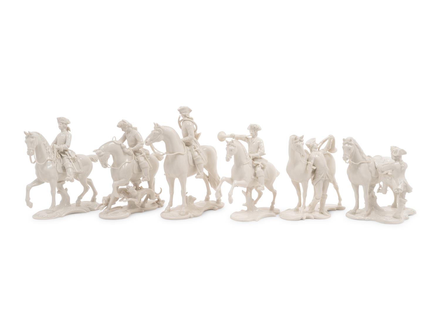 A Group of Twelve Nymphenburg Porcelain Equestrian Groups