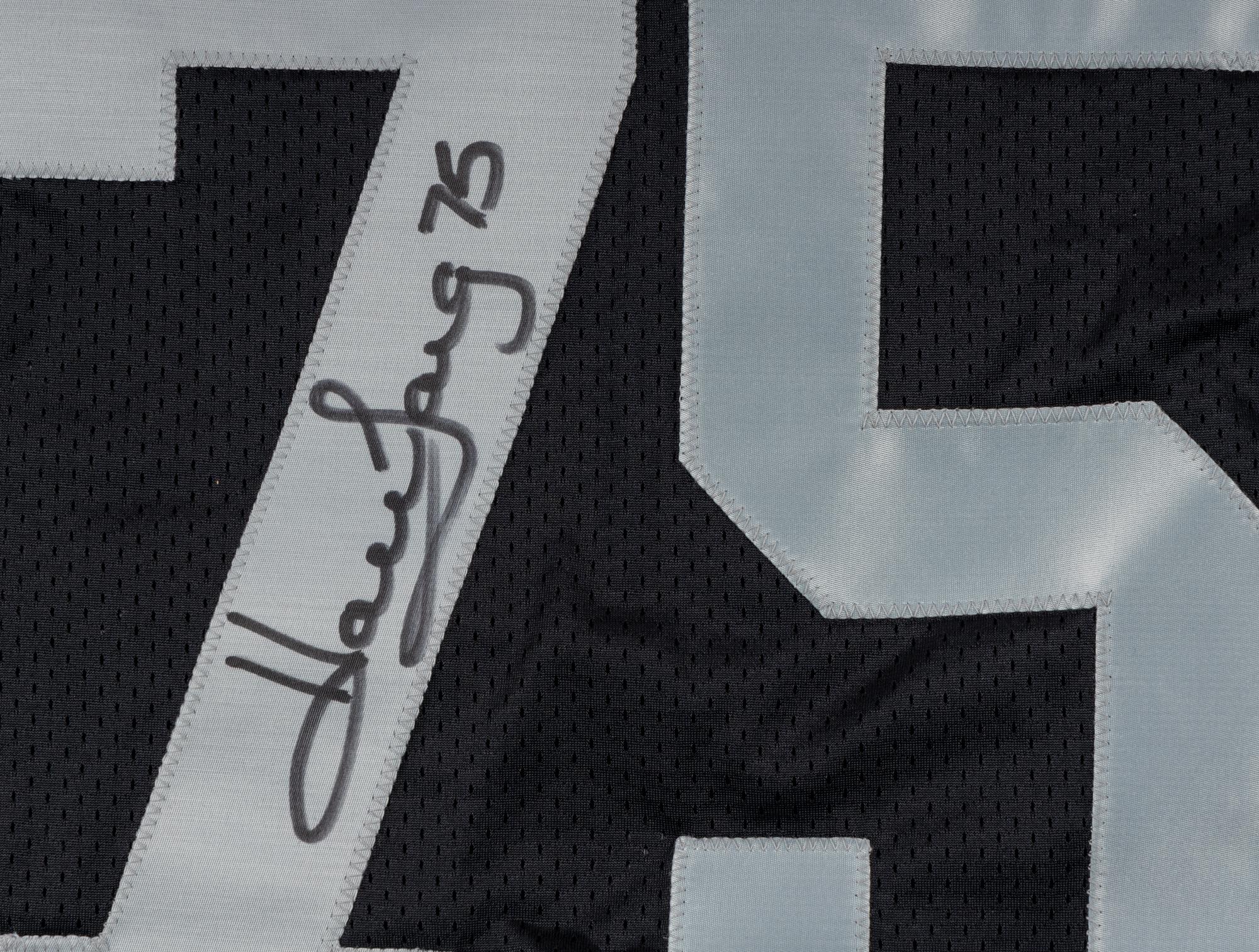 A Group of Howie Long Signed Autograph Items Featuring a Game Model Raiders Jersey