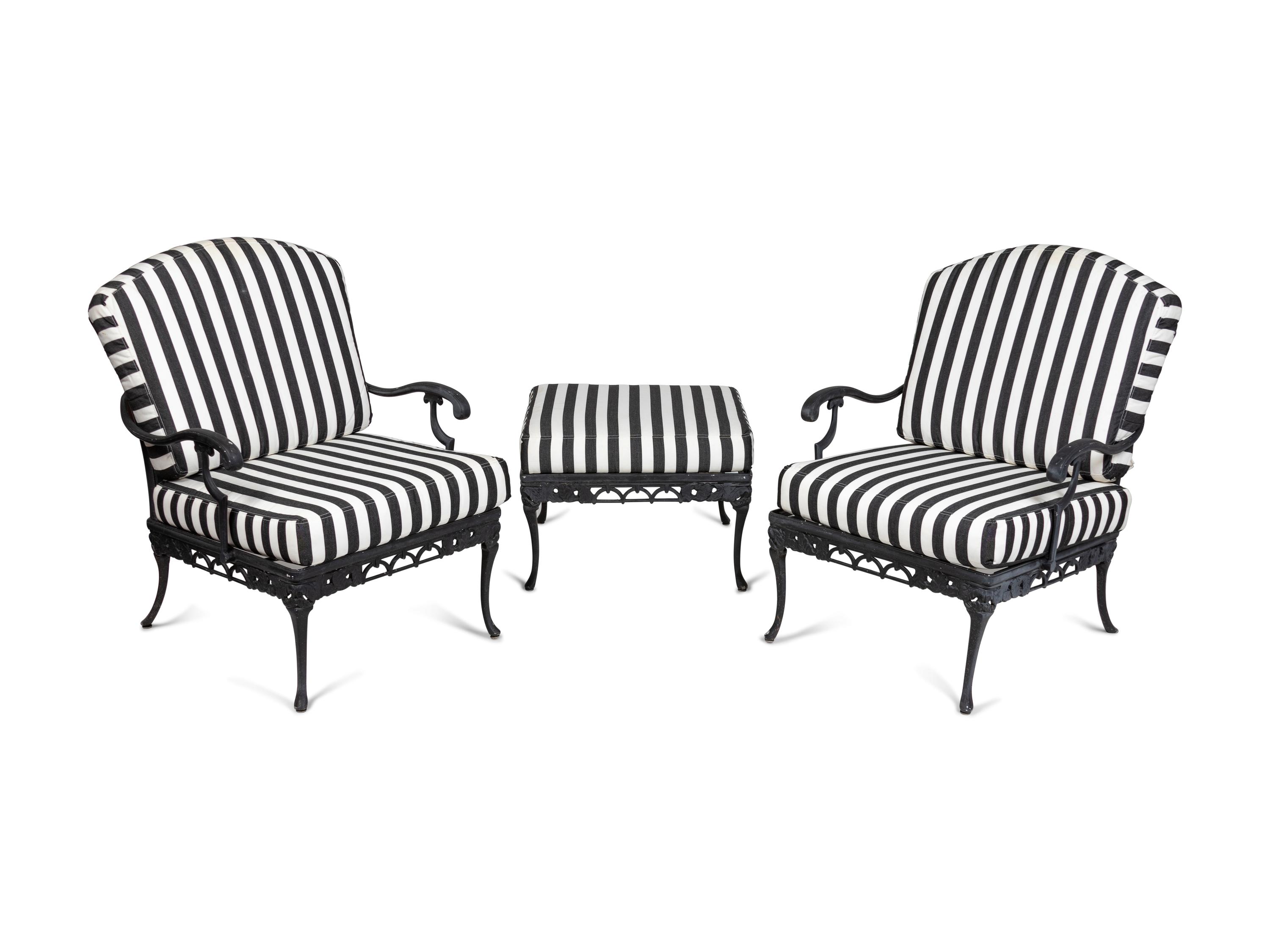 A Pair of Metal Garden Chairs and an Ottoman