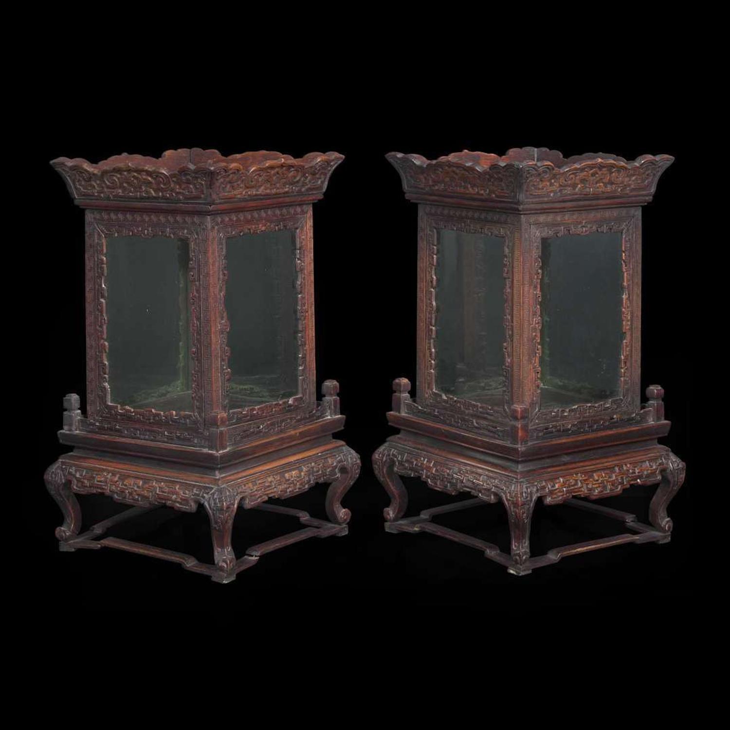 A pair of Chinese carved hardwood lanterns or small vitrines 硬木灯笼一对