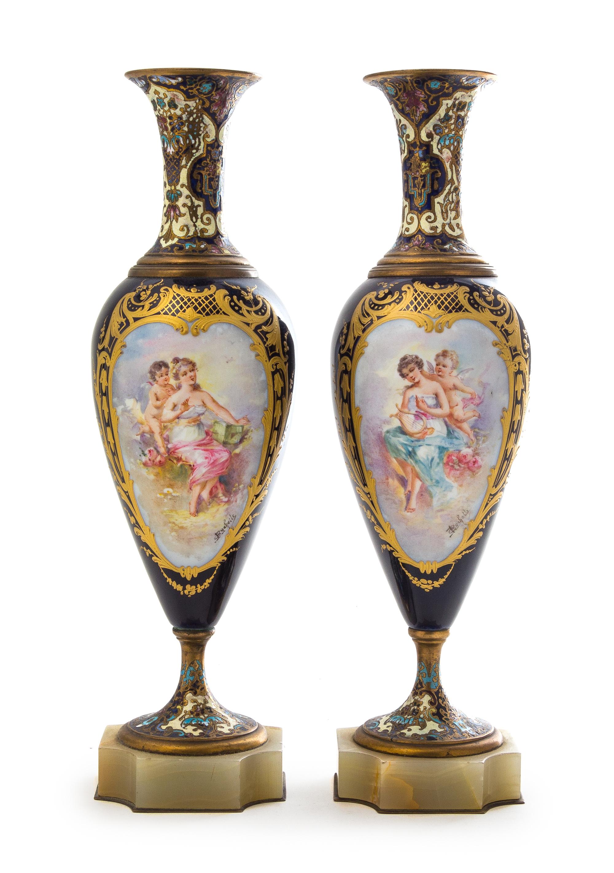 A Pair of Sevres Style Porcelain, Onyx and Champleve Urns Height 12 3/8 inches.