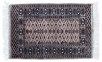 An Oriental Wool Rug 3 feet 1 inch x 2 feet 1 inch.