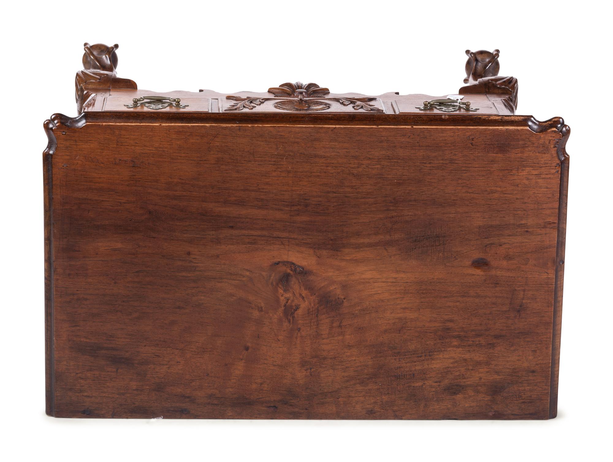 A Chippendale Style Carved Walnut Claw-and-Ball Foot Dressing Table — LIKELY LATE 19TH/EARLY 20th CENTURY INCORPORATING EARLIER ELEMENTS