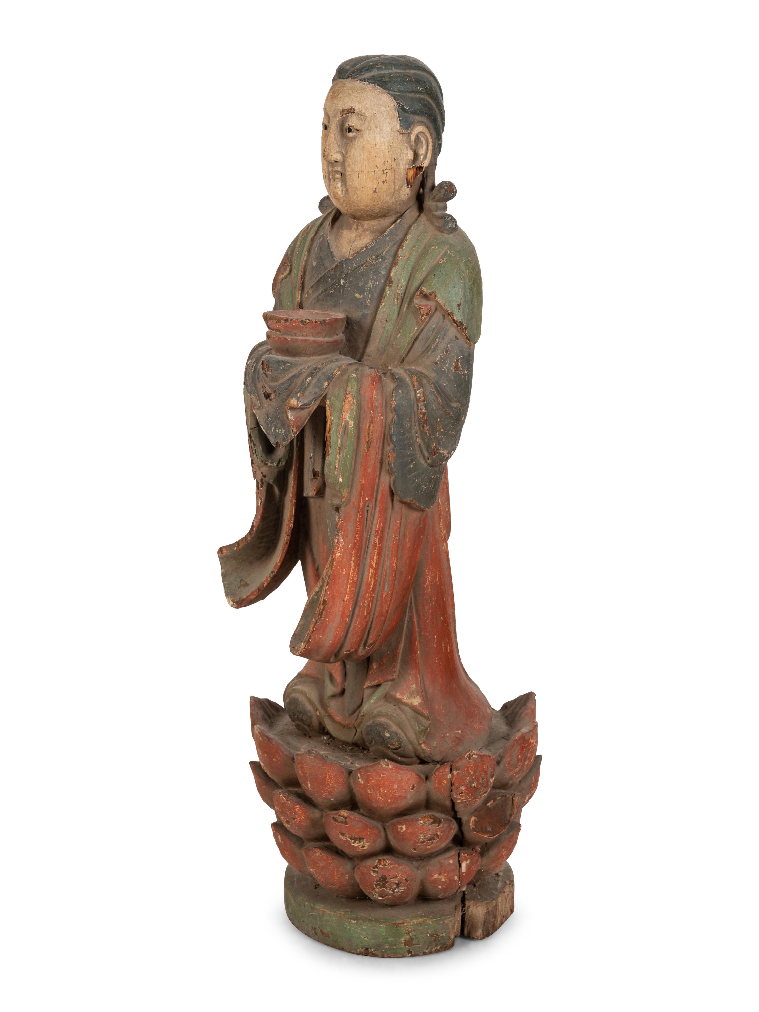 A Chinese Carved Wood Standing Figure with Polychrome Decoration