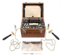 A Oak Cased Portable Faradic Battery Width of case 8 3/4 inches. — 19TH/20TH CENTURY