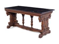 A Karpen Renaissance Revival Carved Oak Marble-Top Table
