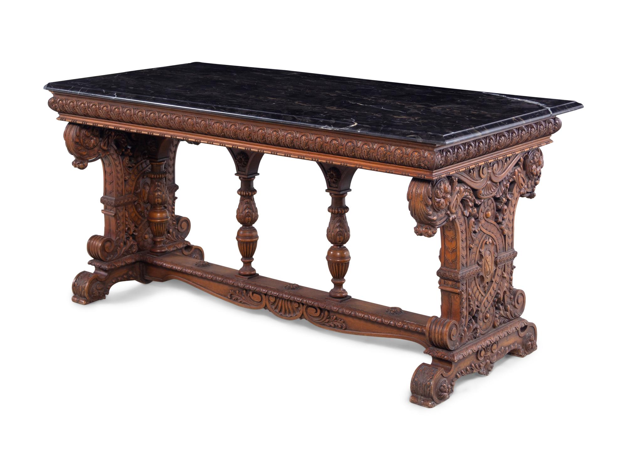 A Karpen Renaissance Revival Carved Oak Marble-Top Table