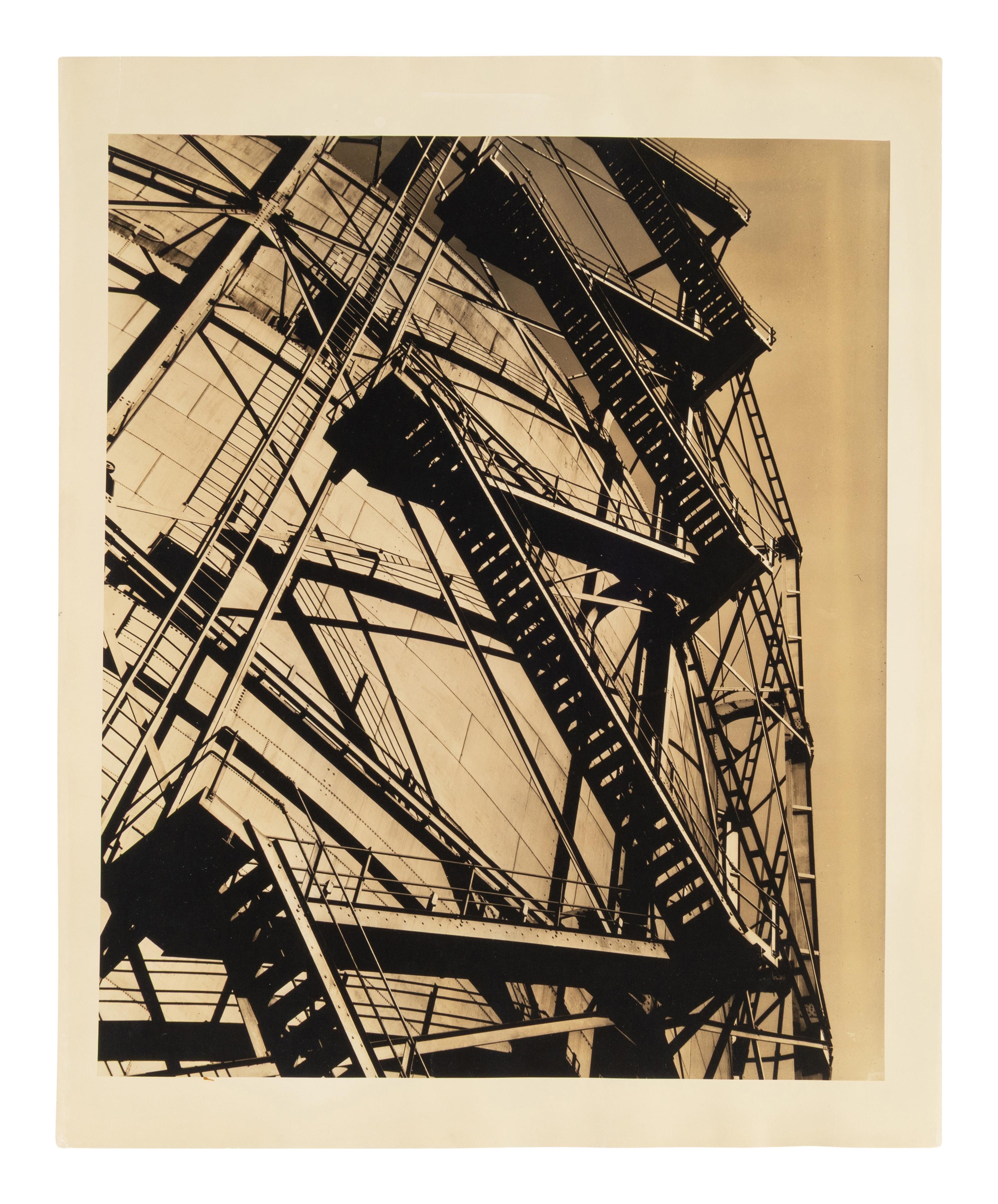 A group of five works ( Spools; Peter Lorre; #5; Model Standing in Rocks; Stairway Up Fuel Storage Tank )