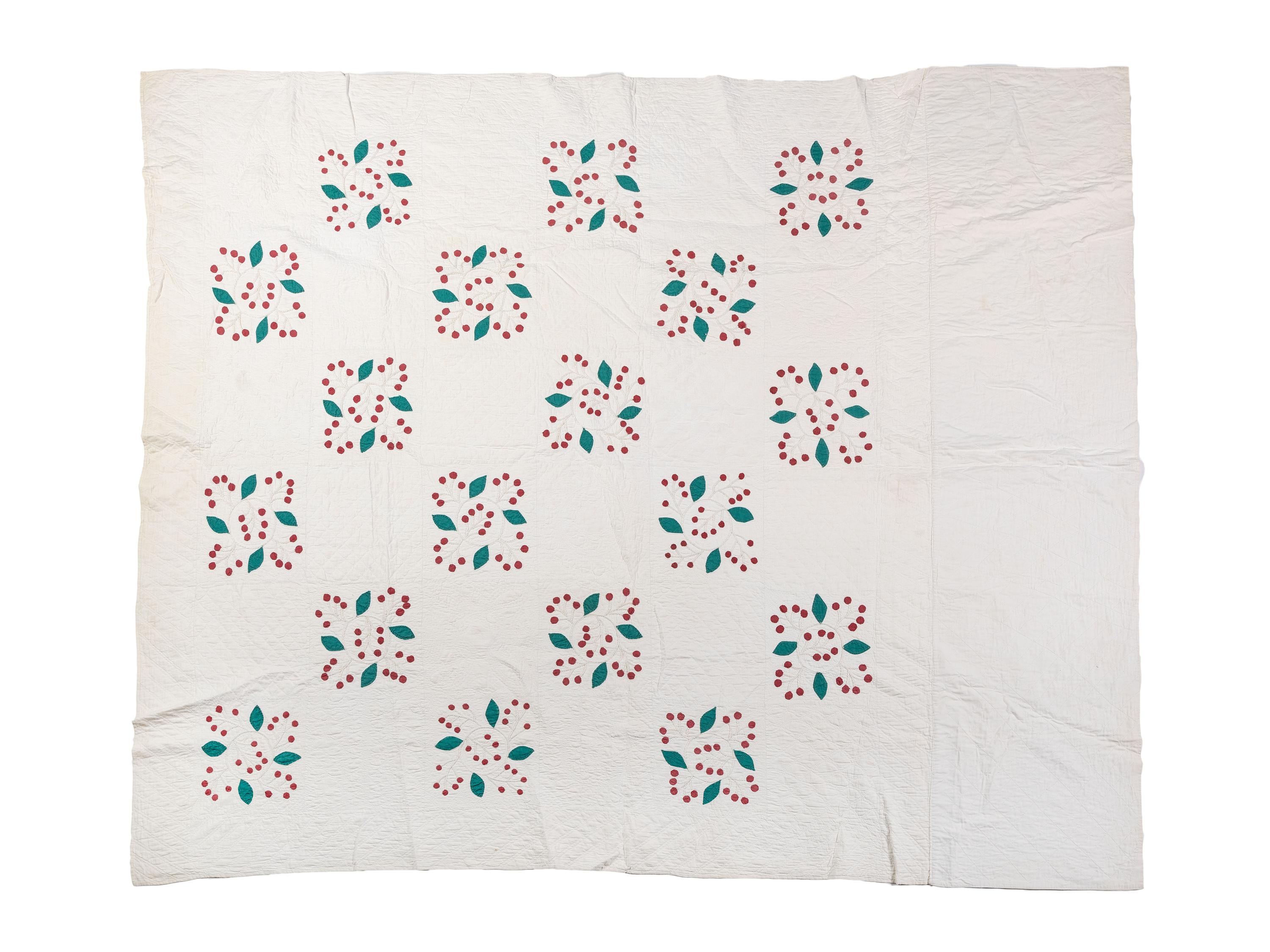 A Cherry Blossom Pattern Pieced Cotton Quilt