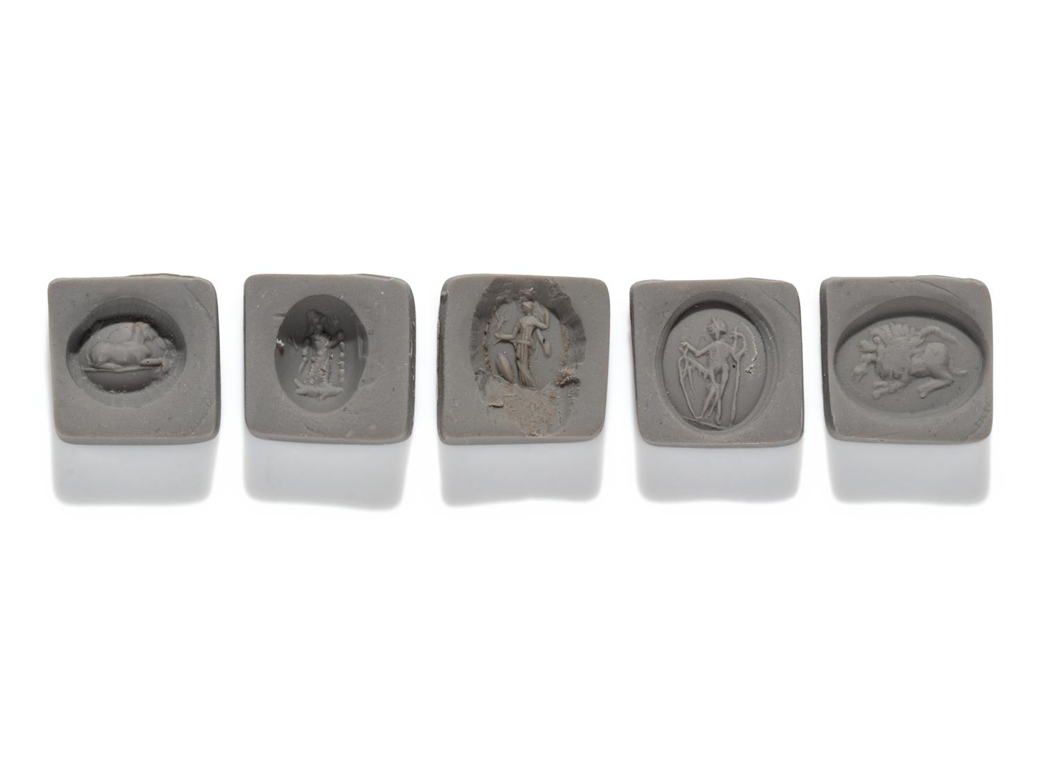 A Roman Iron Ring and Four Ring Stones