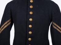 [CIVIL WAR]. Enlisted frock coat identified to Private Charles A. Fisk, 11th Massachusetts Infantry, WIA at Gettysburg.