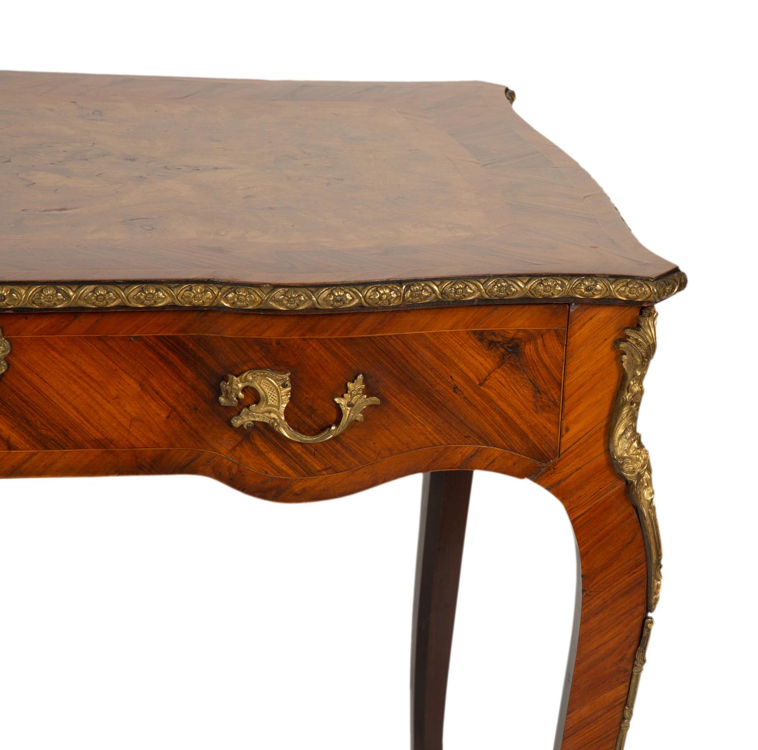A Louis XV Style Gilt Metal Mounted Kingwood Writing Desk