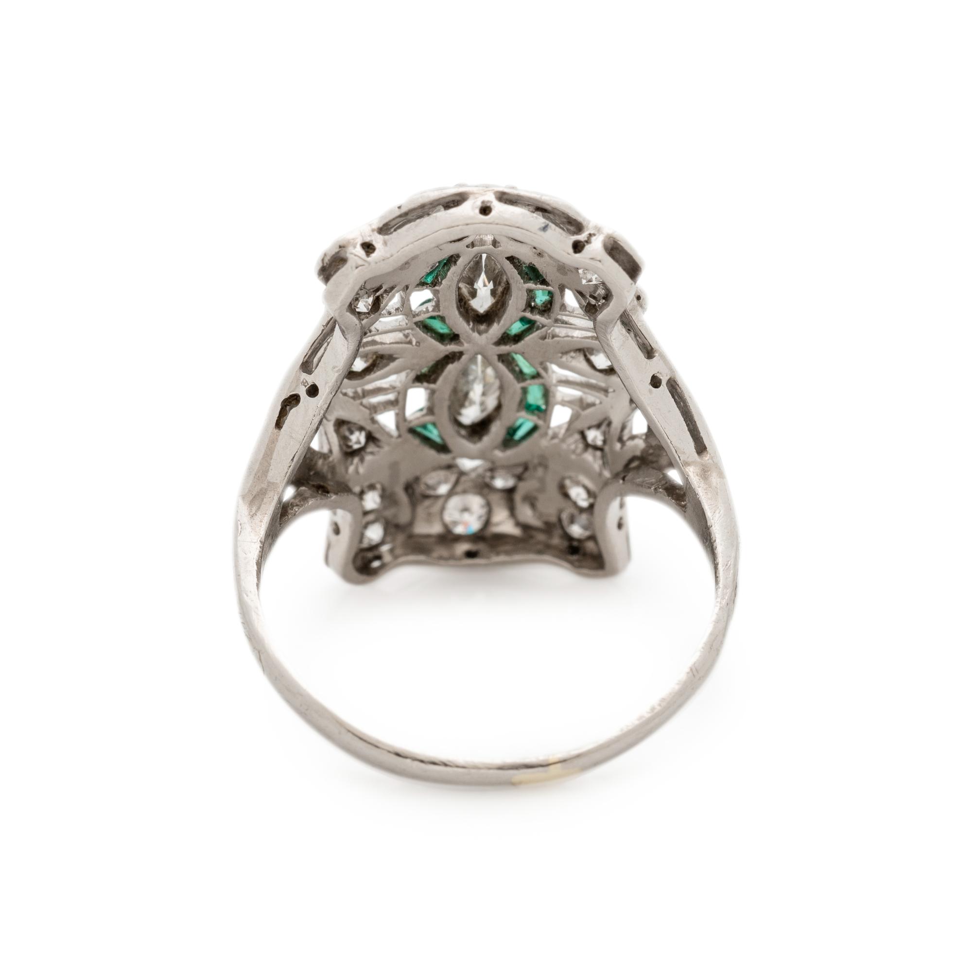 PLATINUM, DIAMOND AND EMERALD RING