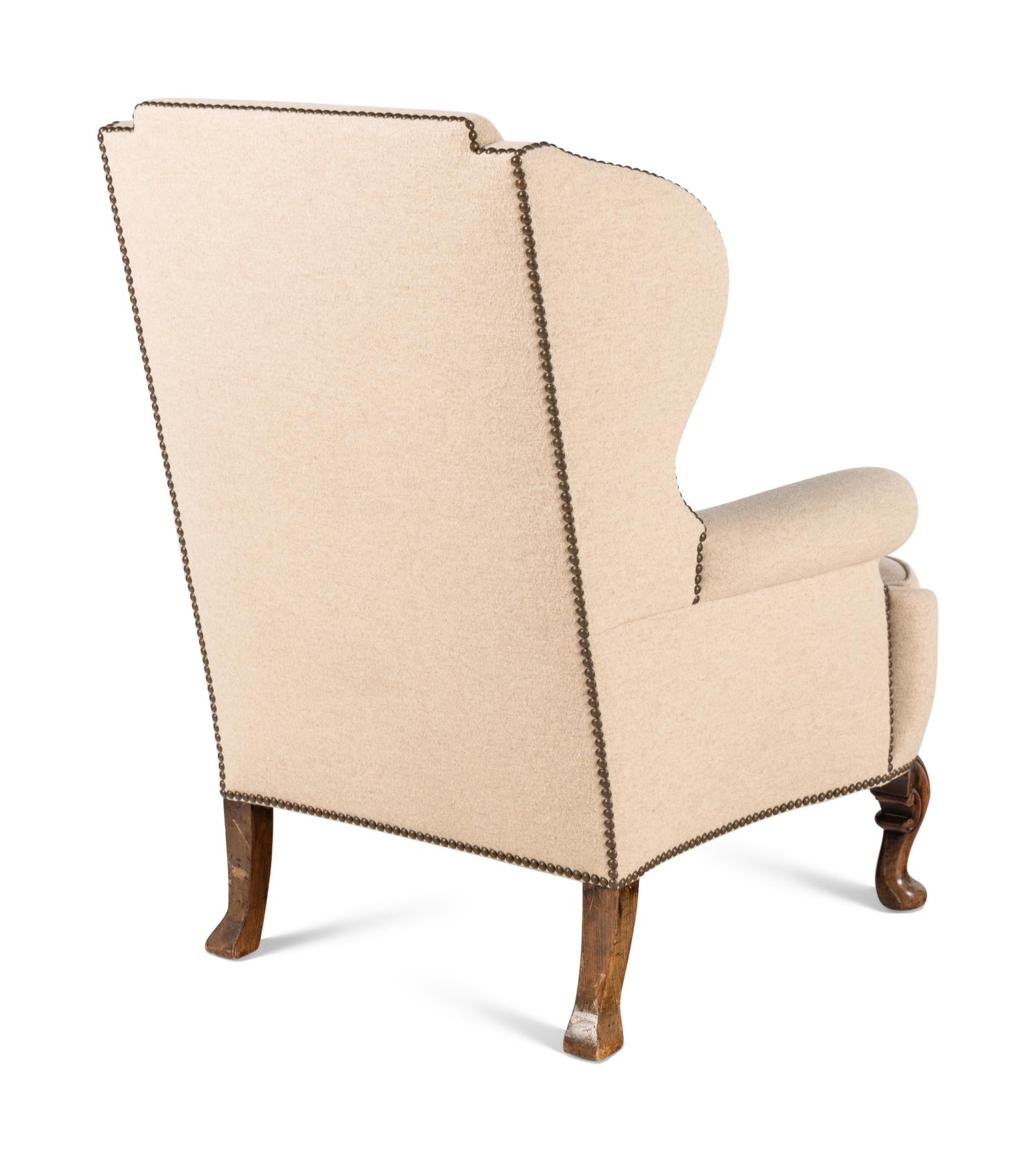 A Pair of Queen Anne Style Wingback Armchairs