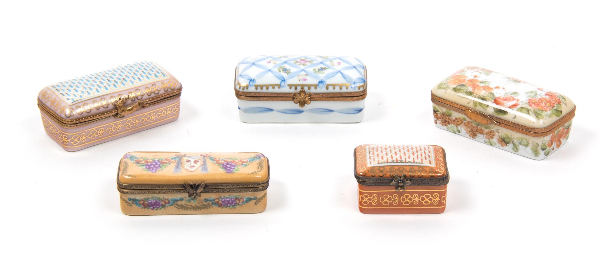 Five Limoges Hand Painted Porcelain Boxes Length of largest 3 1/2 inches.