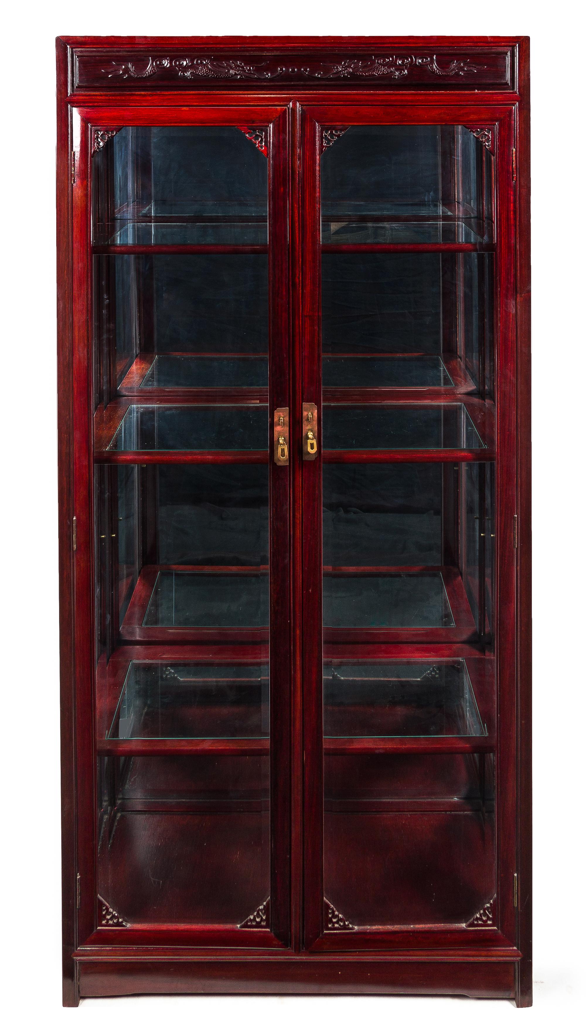 A Large Chinese Rosewood Display Cabinet Height 78 x width 38 x depth 15 inches.