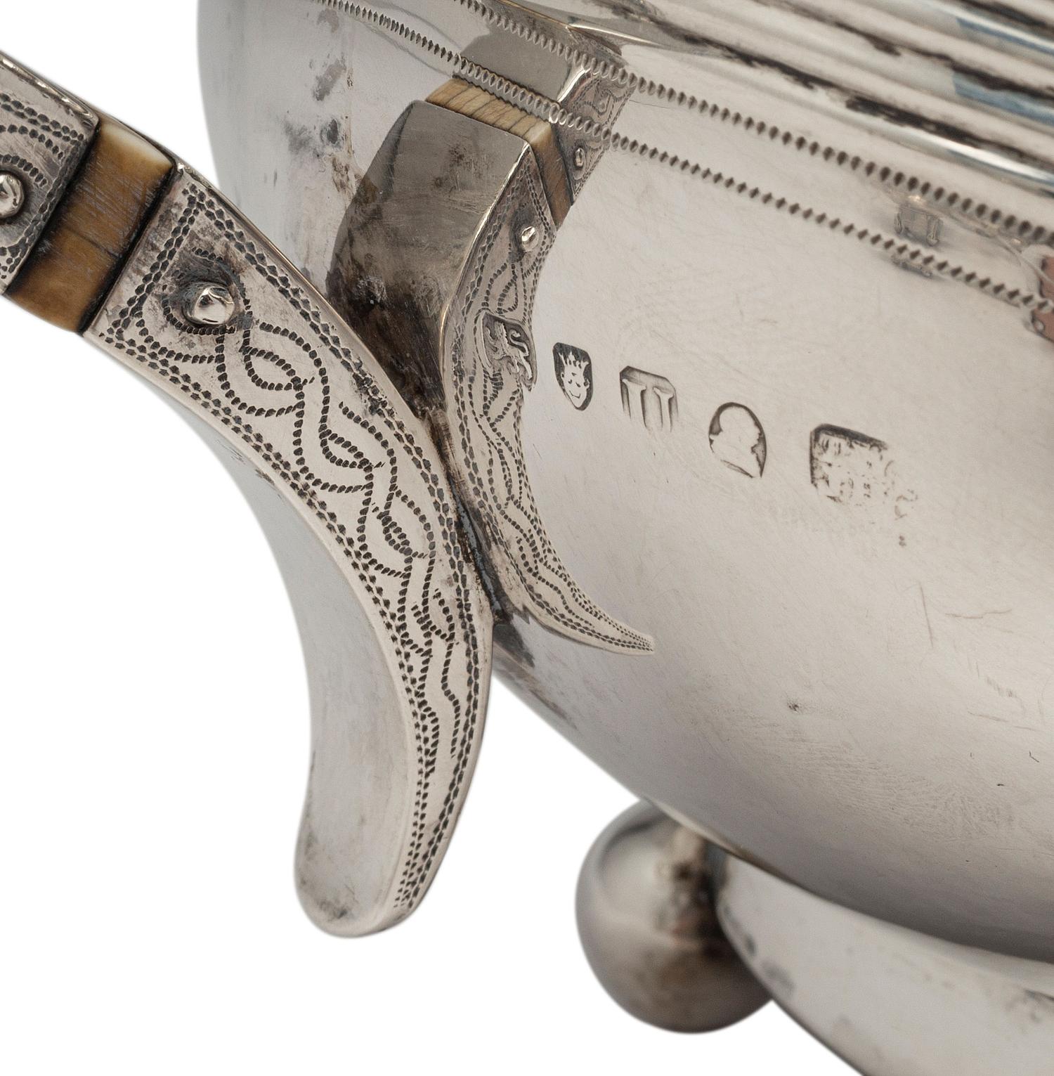 An English Silver Four-Piece Coffee and Tea Service
