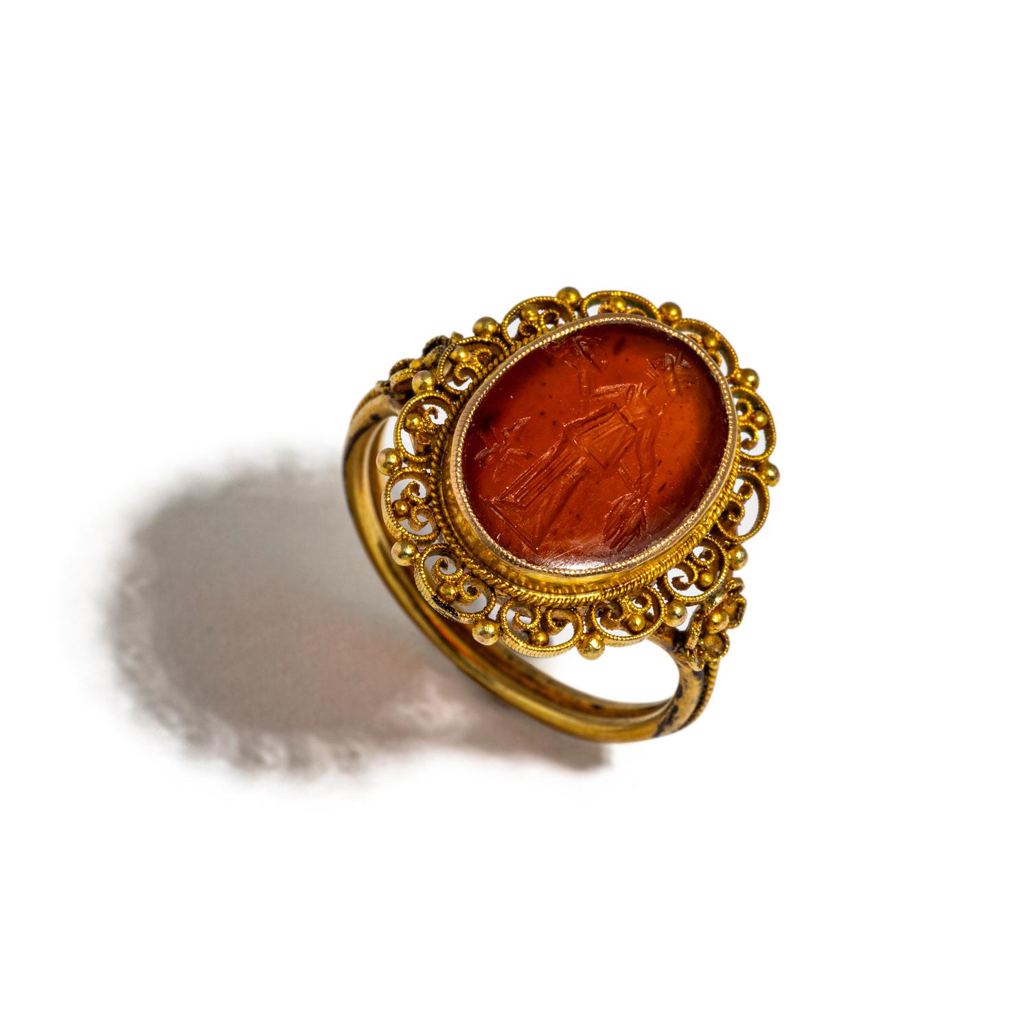 A Roman Carnelian Ring Stone with the Goddess Ceres — Set in a gold ring