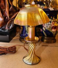 A Tiffany Studios Favrile Glass Candlestick Lamp Height 12 3/4 inches.