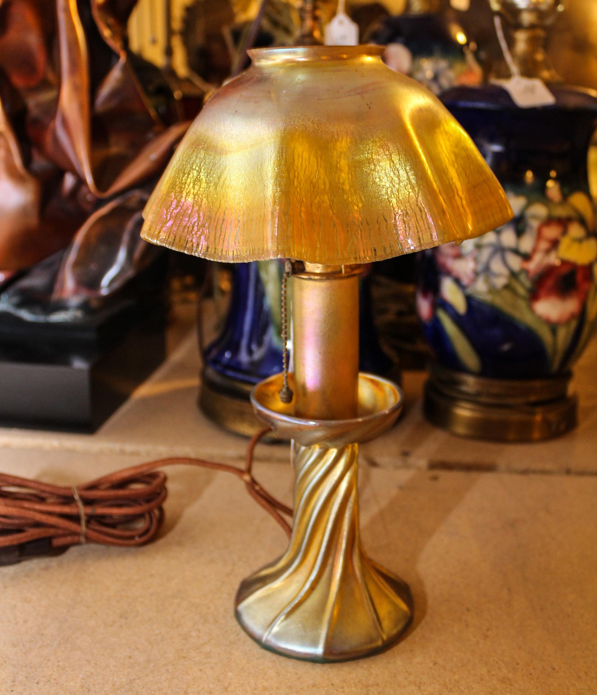 A Tiffany Studios Favrile Glass Candlestick Lamp Height 12 3/4 inches.