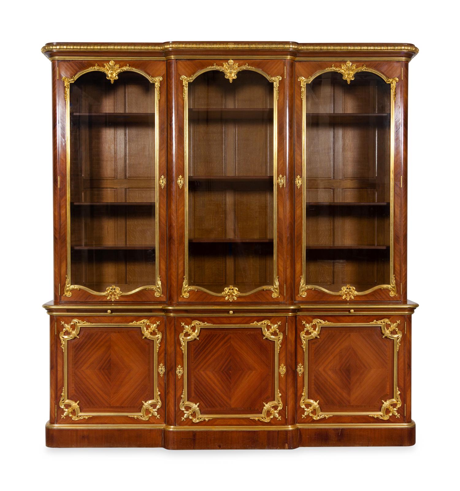 A Louis XV Style Gilt Bronze Mounted Kingwood Breakfront Cabinet