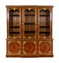 A Louis XV Style Gilt Bronze Mounted Kingwood Breakfront Cabinet