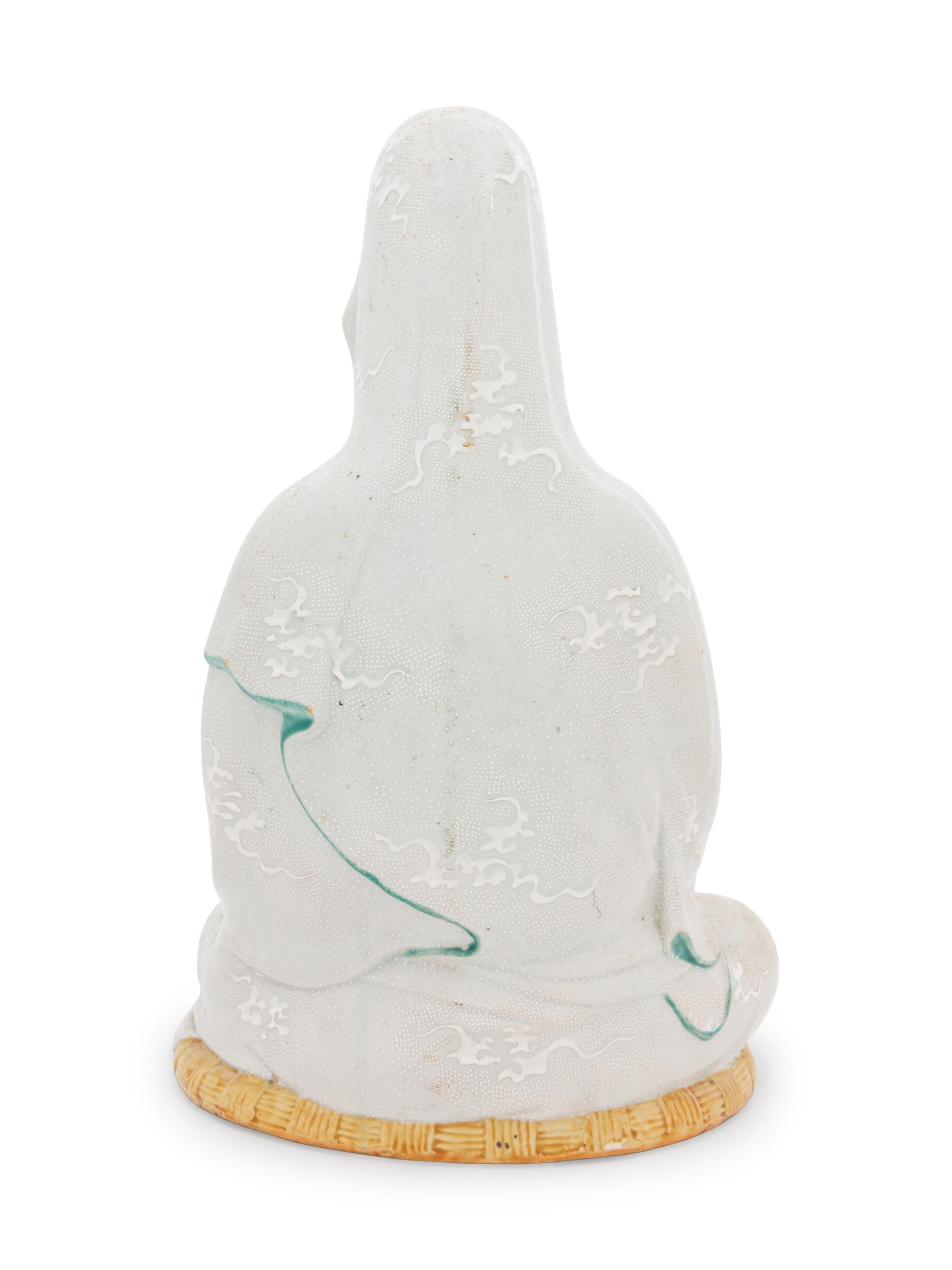 A Polychrome Decorated Porcelain Figure of Kannon