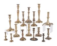 Sixteen English Brass Candlesticks