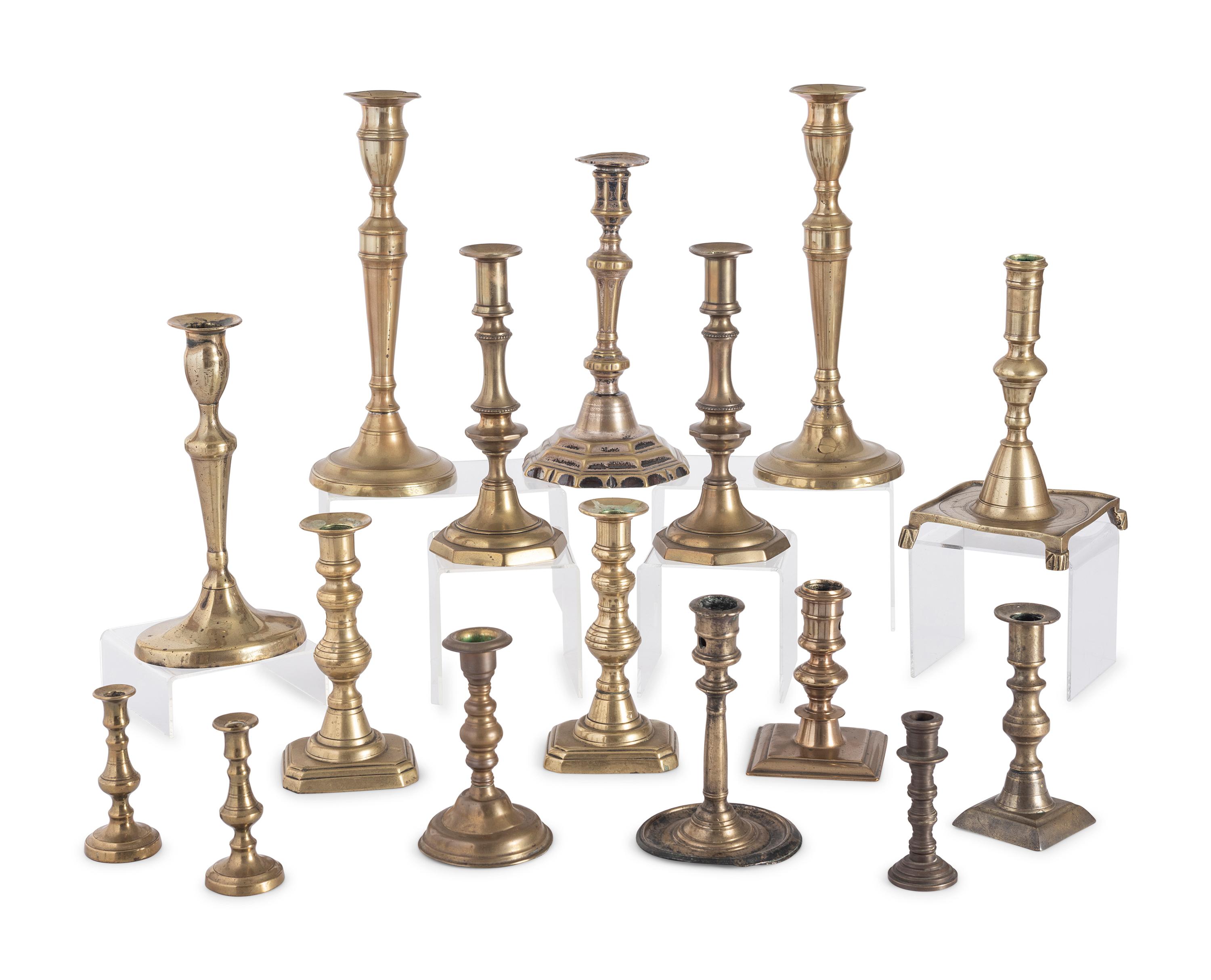 Sixteen English Brass Candlesticks