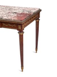 A Louis XVI Style Gilt Bronze Mounted Mahogany Marble-Top Table