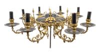 An Empire Style Gilt Bronze and Tole Eight-Light Chandelier Diameter 27 inches.