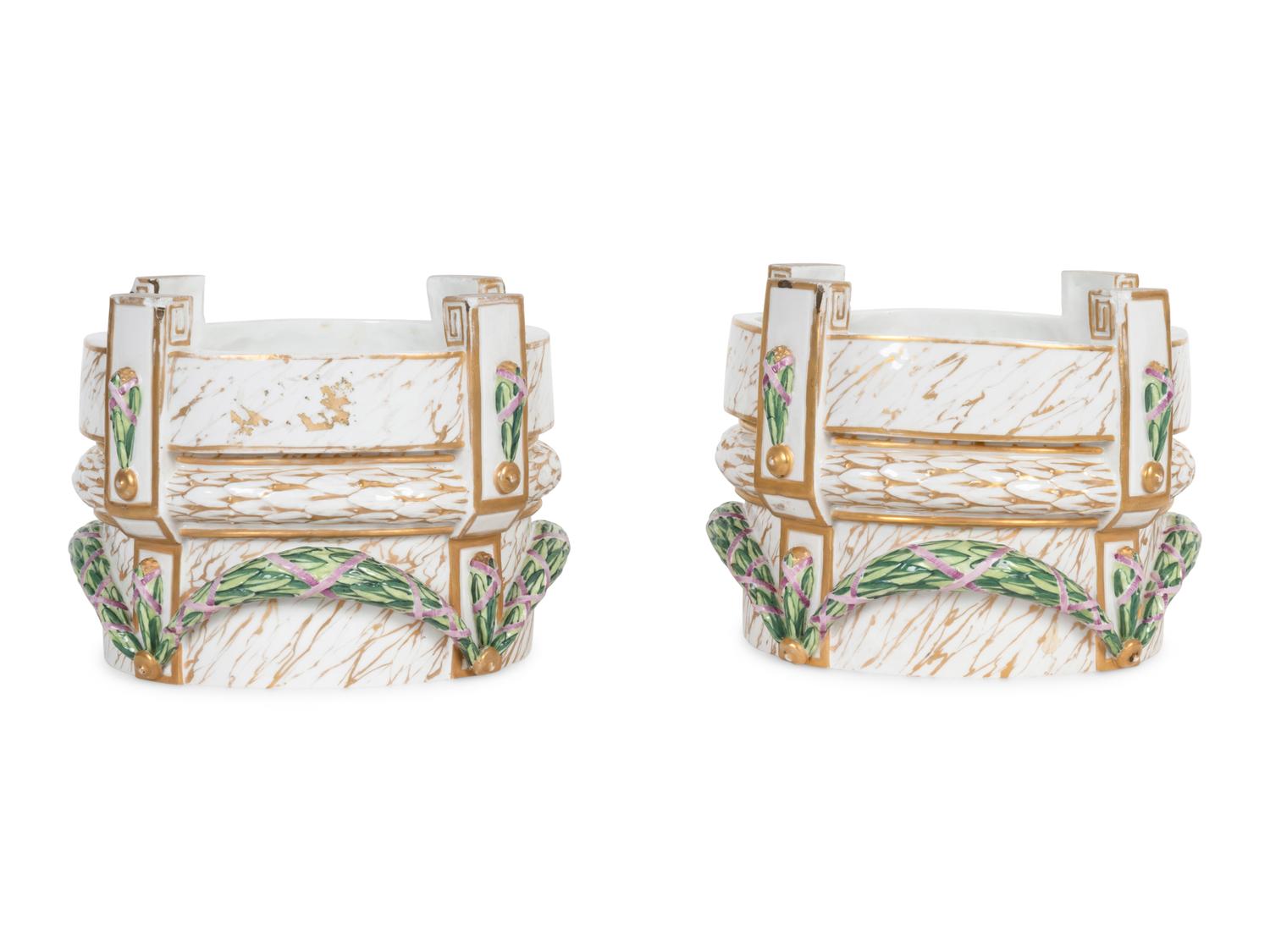 A Pair of Continental Porcelain Stands
