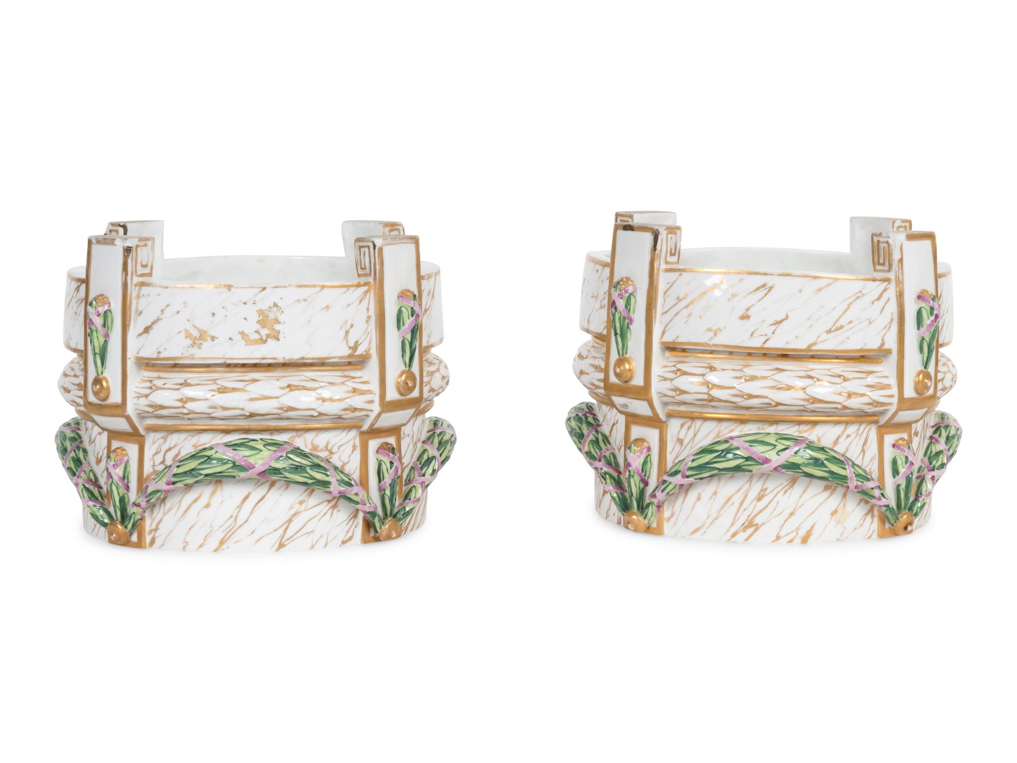 A Pair of Continental Porcelain Stands