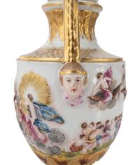 A Capodimonte Painted and Parcel-Gilt Porcelain Covered Urn