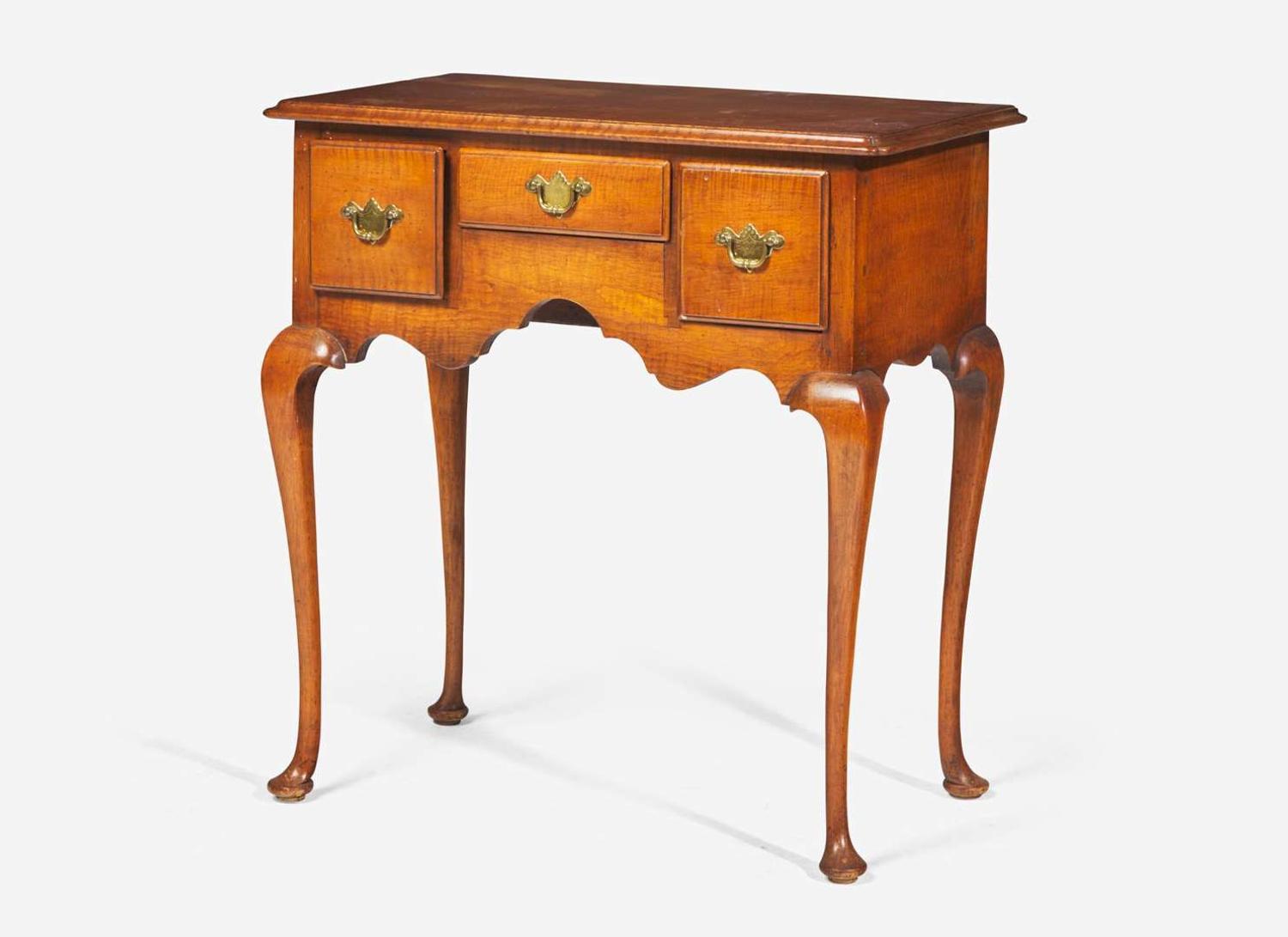 A Queen Anne style tiger maple dressing table, early 20th century