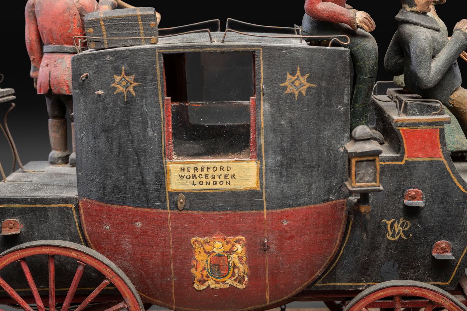 A Folk Art Carved and Painted Wood English Royal Stagecoach