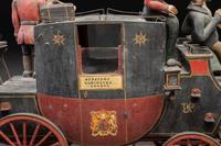 A Folk Art Carved and Painted Wood English Royal Stagecoach