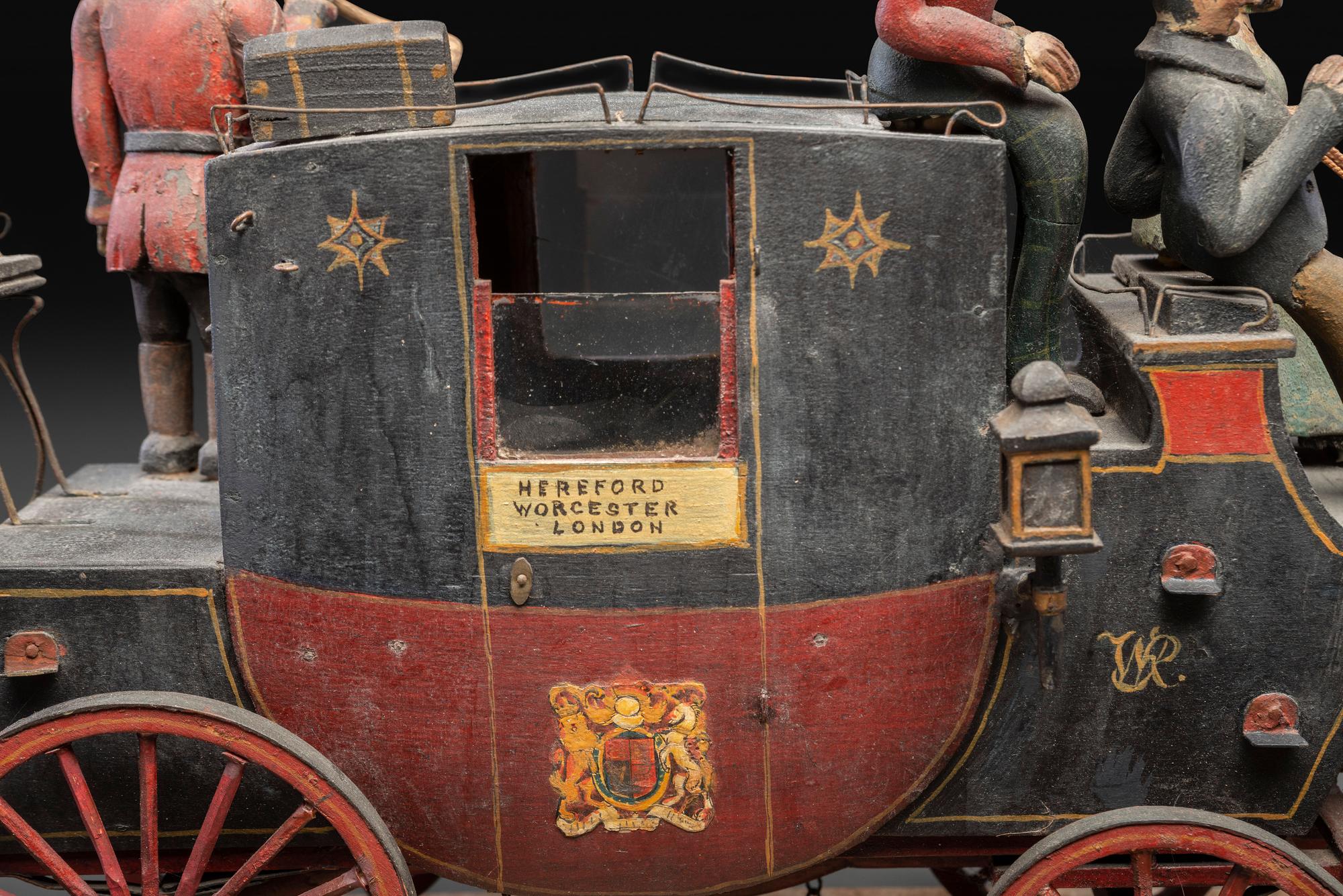 A Folk Art Carved and Painted Wood English Royal Stagecoach