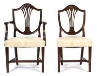 A Set of Eight Hepplewhite Style Mahogany Dining Chairs Height 37 1/2 inches. — 20TH CENTURY