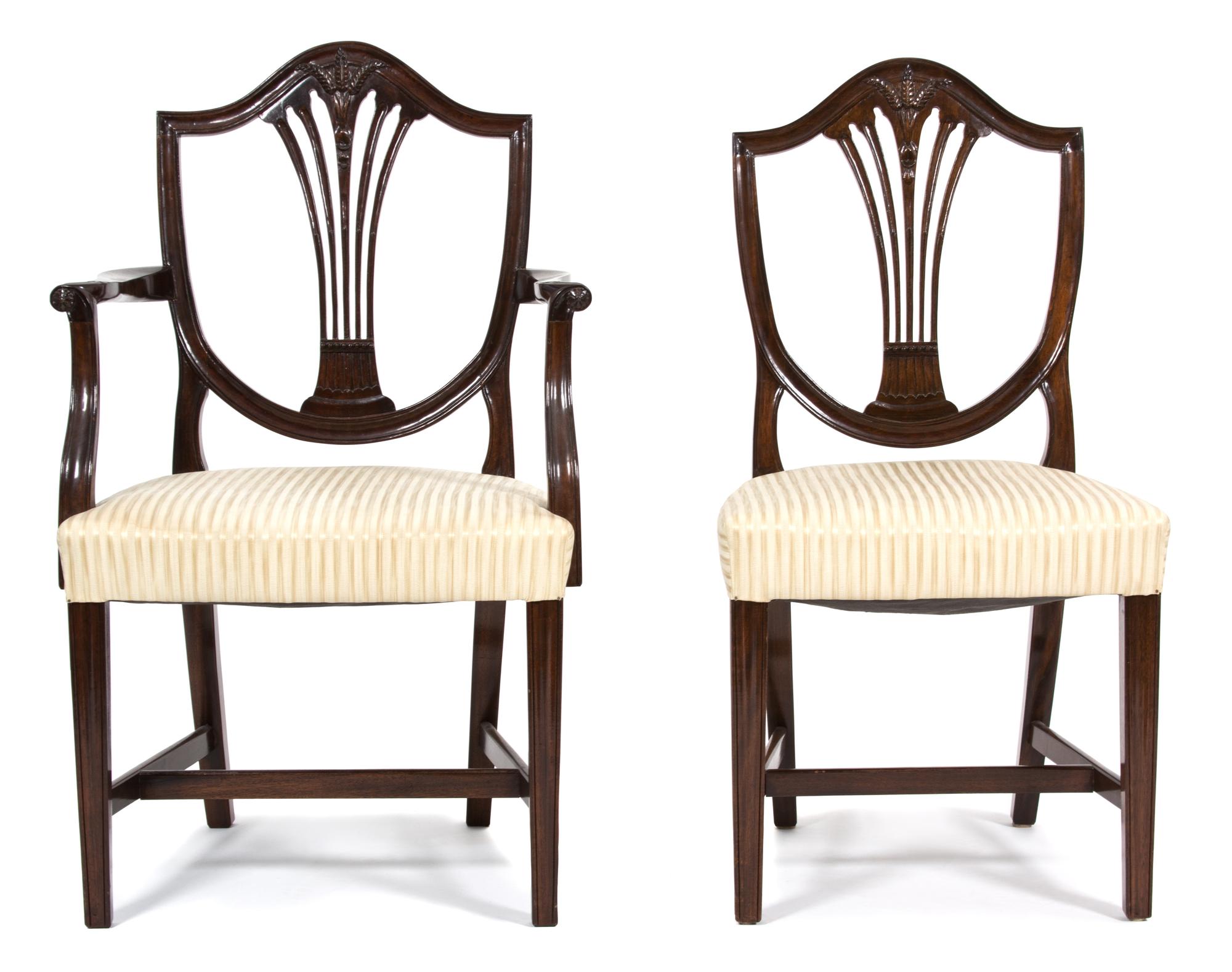 A Set of Eight Hepplewhite Style Mahogany Dining Chairs Height 37 1/2 inches. — 20TH CENTURY