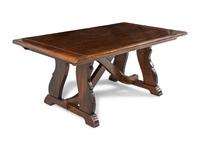 A Spanish Colonial Style Oak Trestle Table