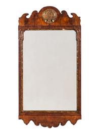 A Queen Anne Walnut and Giltwood Mirror