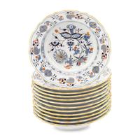 A Set of Twelve Meissen Parcel Gilt Blue Onion Porcelain Soup Plates