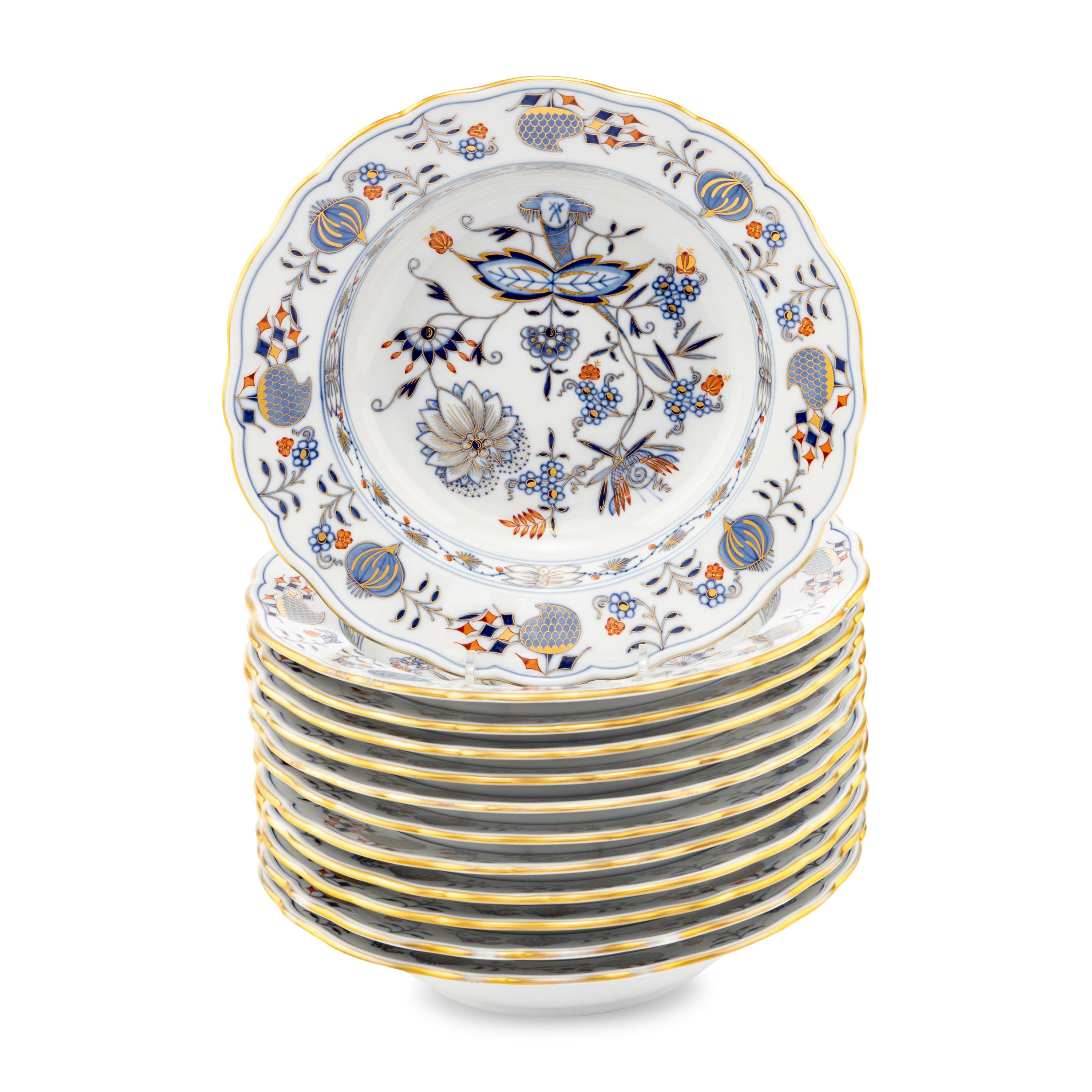 A Set of Twelve Meissen Parcel Gilt Blue Onion Porcelain Soup Plates