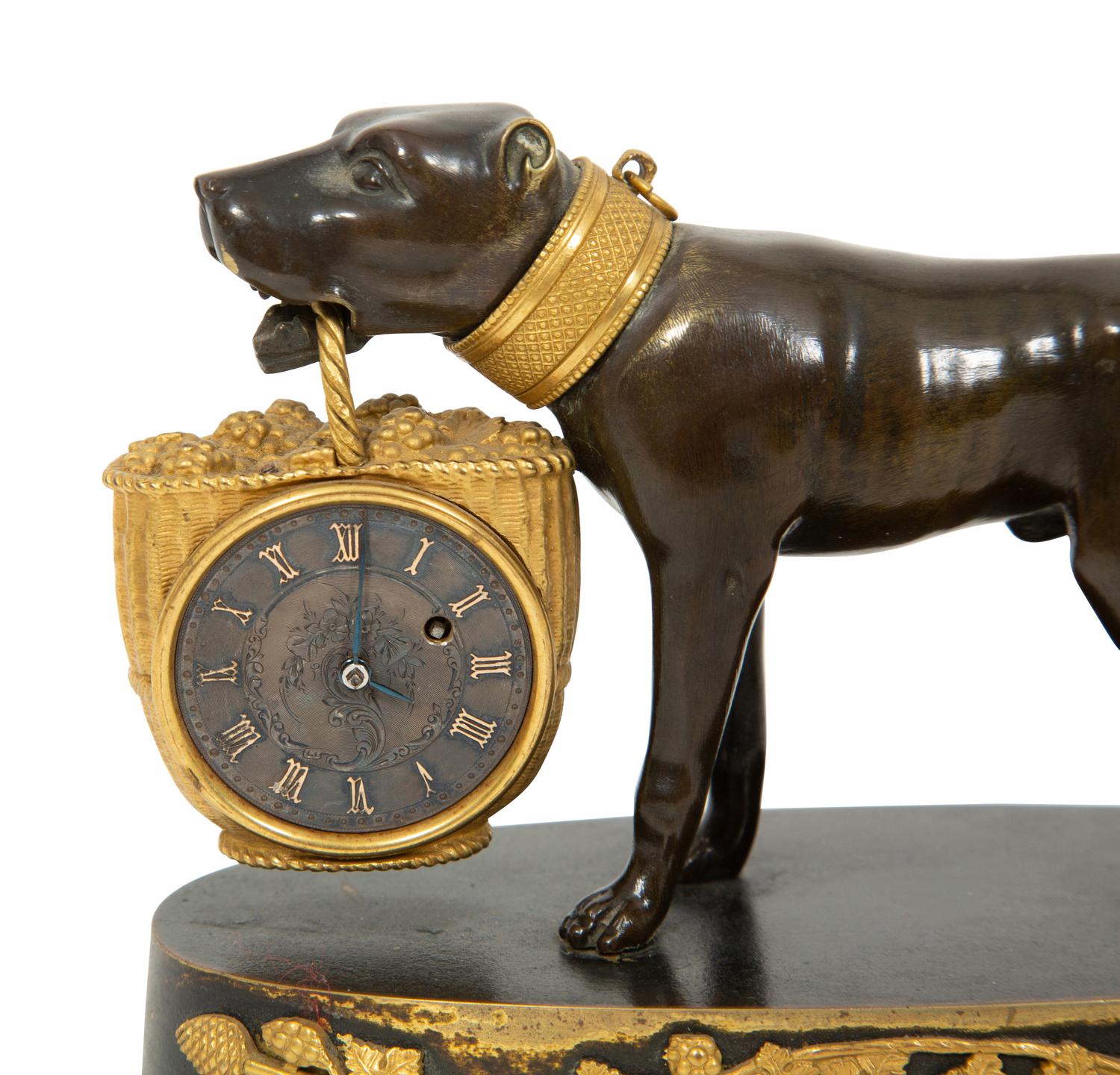A Small French Gilt and Patinated Bronze Dog Clock
