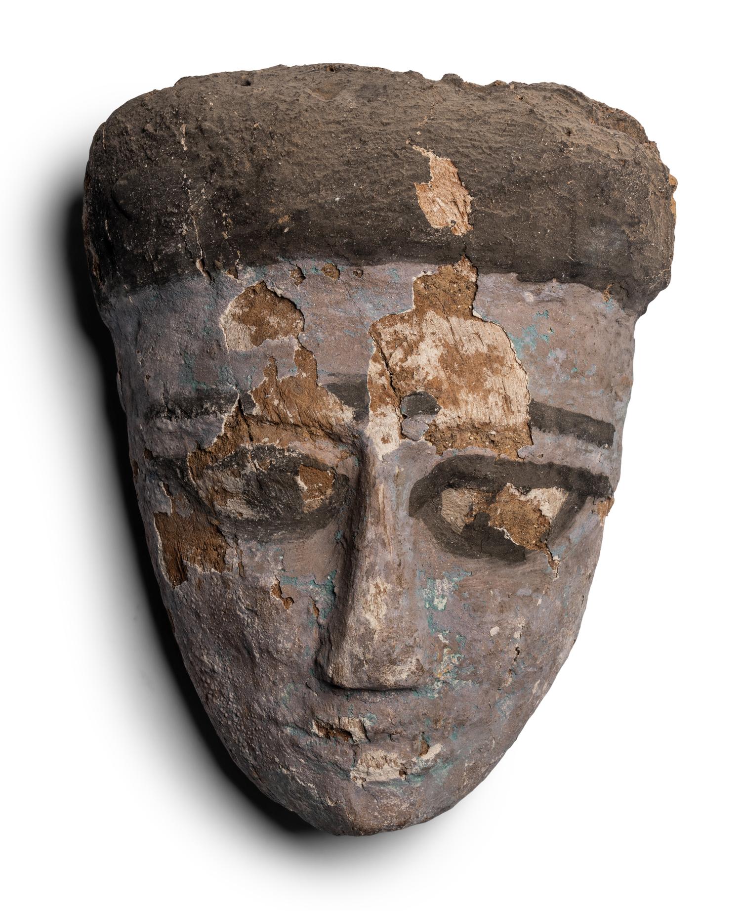 An Egyptian Painted Wood Mummy Mask