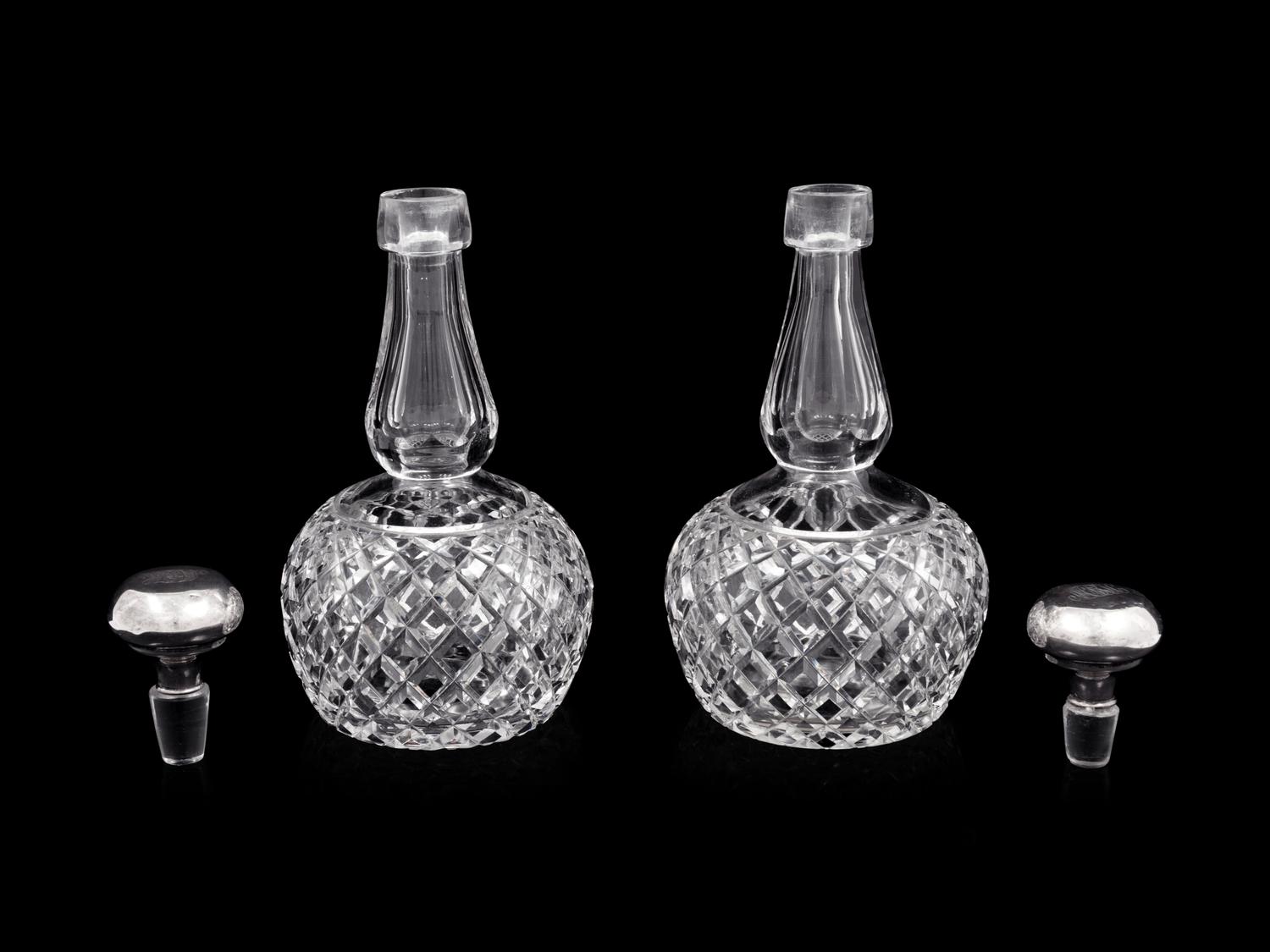 A Pair of American Cut Glass Decanters with Silver Stoppers