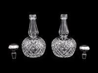 A Pair of American Cut Glass Decanters with Silver Stoppers